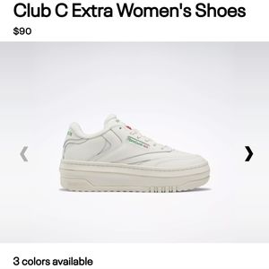 Platform White Reeboks. Green accents and lettering. Great condition.